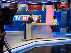 Professional TV studio lights used in a news broadcasting setting