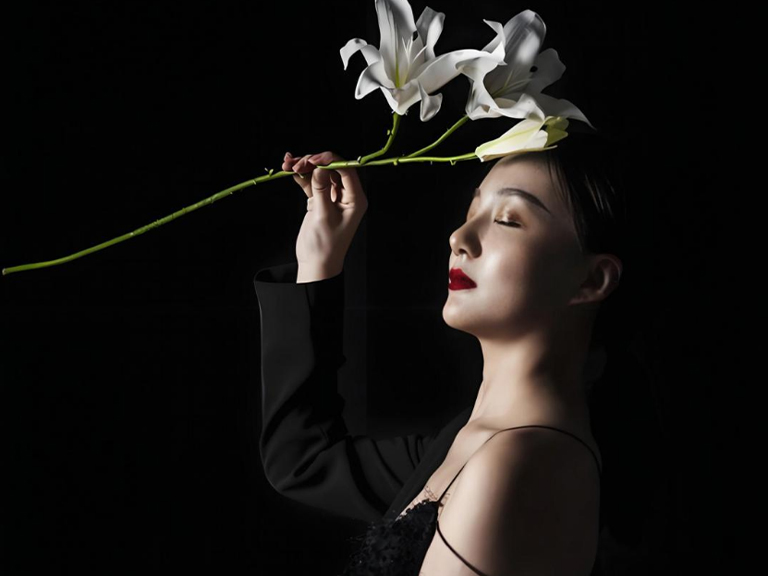 Fashion portrait of a model illuminated by soft LED studio lights